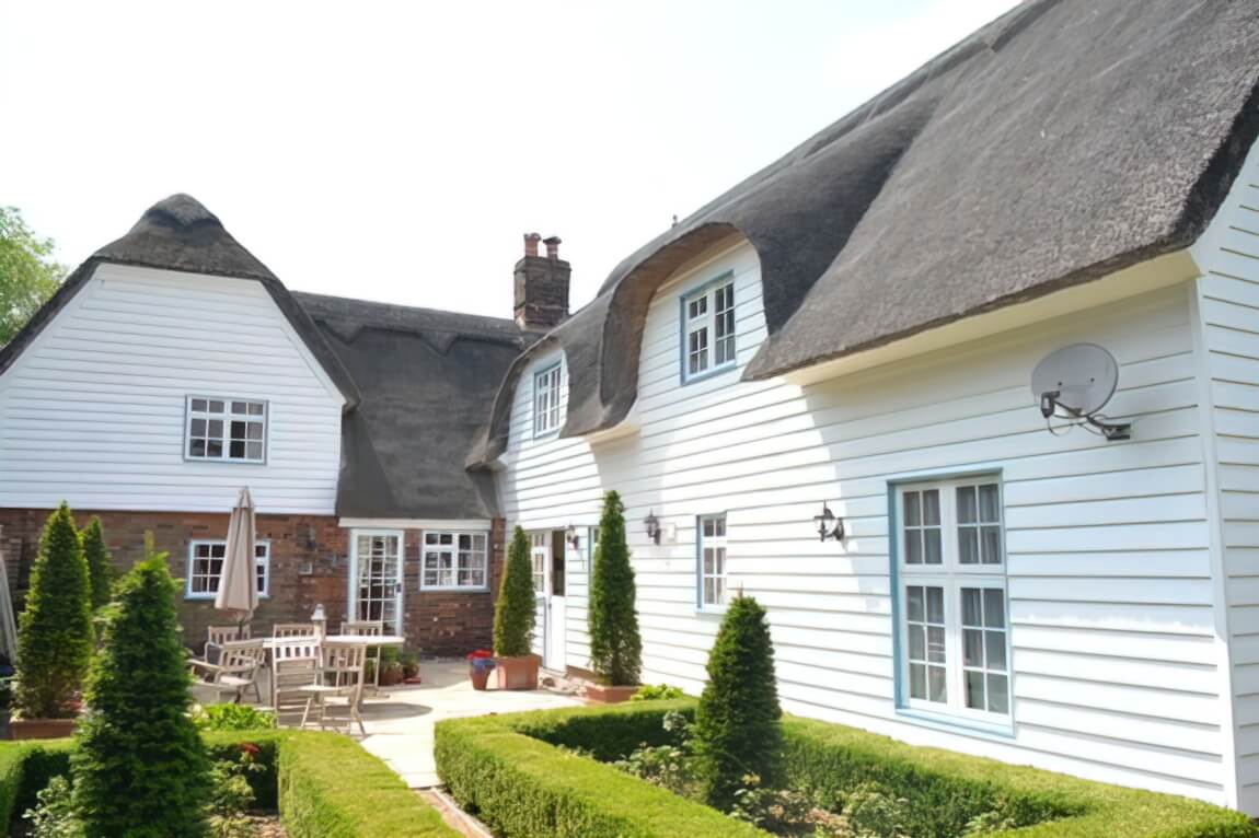 Windows and cladding renovation in a Grade 2 listed cottage