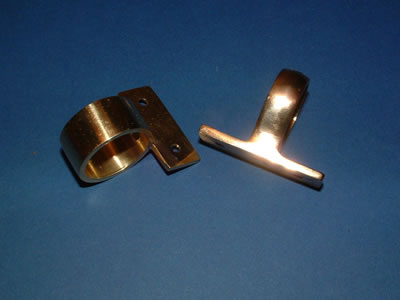 A brass ring-pull sash lift and a hook sash lift
