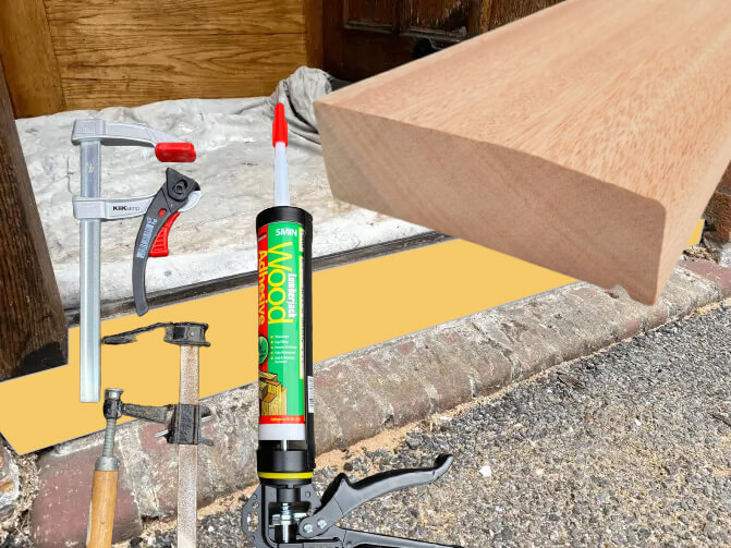 A new hardwood door sill with a cartridge of wood adhesive, a sealant gun and clamps