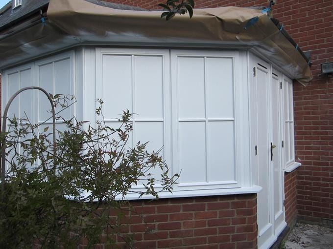 painted over glass bay window