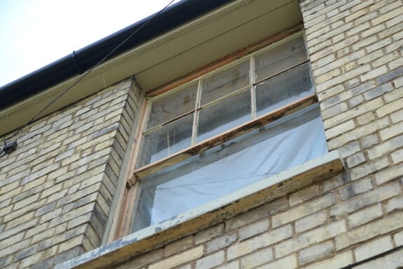 bare wood sash window frame after sanding 