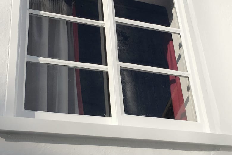 Old sliding cottage window repair. | after