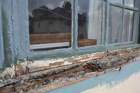 Before: Rotten sill cut out and replaced