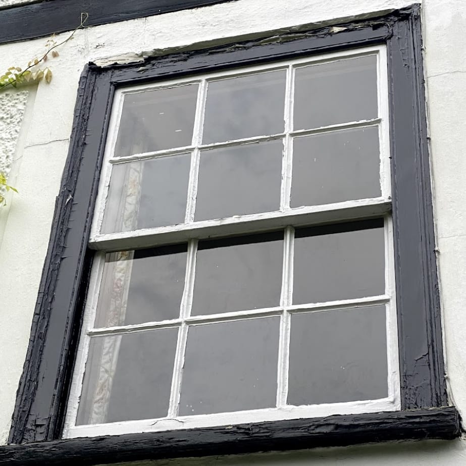Before: A sash window fully restored