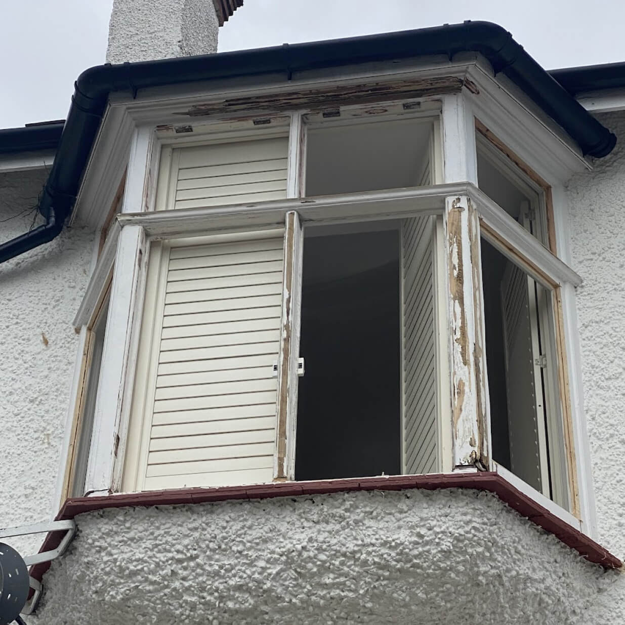 Before: Bay window restored and double glazed